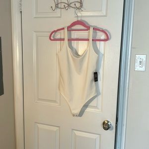 Brand new express body suit!!